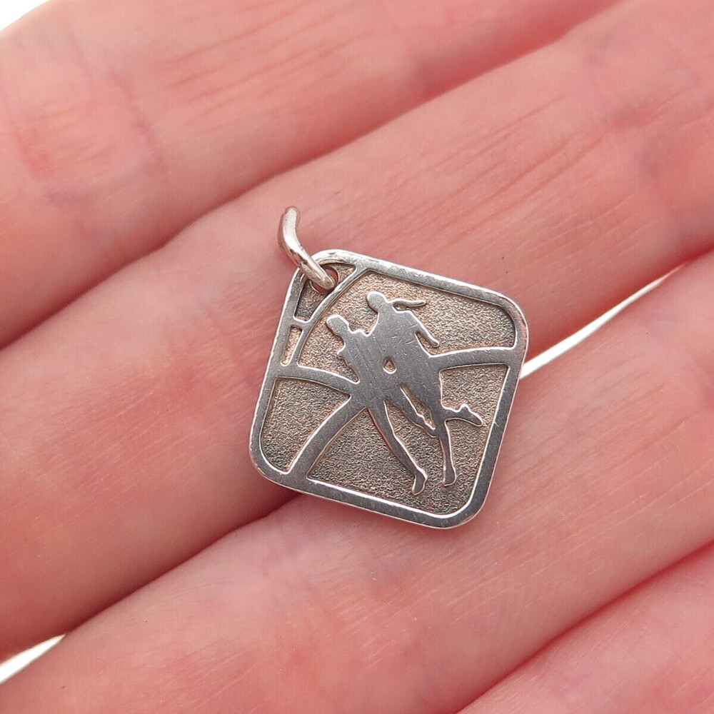 Tiffany & Co. Sterling Silver Vintage Nike Women's Marathon 2007 Mini Pendant